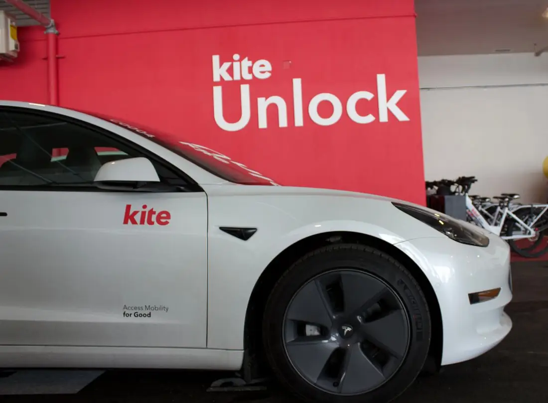 A Kite car parked at The Dale hub by the Kite Unlock wall